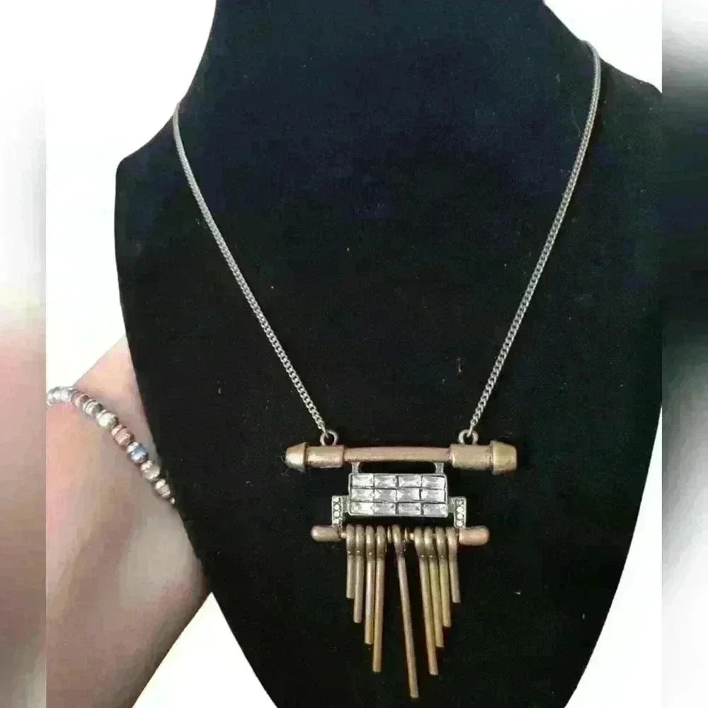 Plunder antique gold tone long necklace